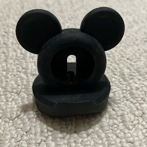 Silicone Disney Mickey shaped Apple Watch charging “puck” holder.
